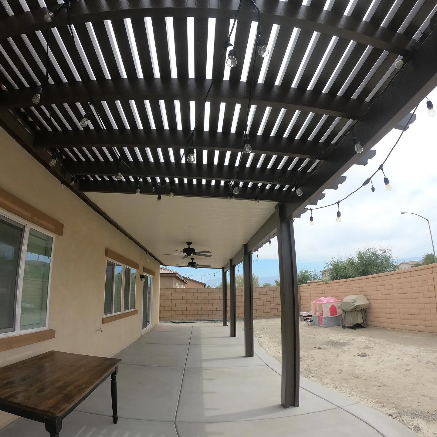 Lattice pergola with string lights